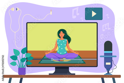 Computer showing video with girl doing yoga. Microphone, headphones and green plant on background. Useful content in Internet. Online content concept