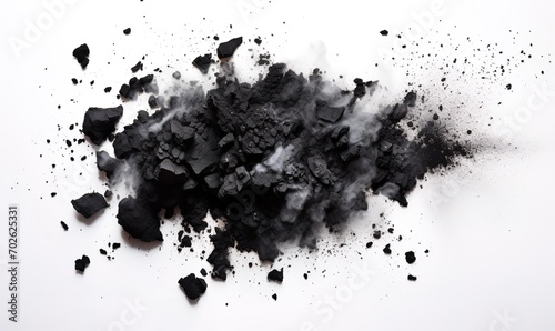 black charcoal photographed from above on a white background. generative AI
