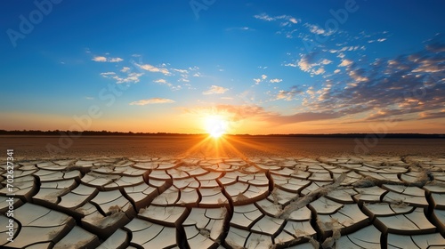 dry land and cracked soil in the dry season with views of the afternoon sun. generative AI