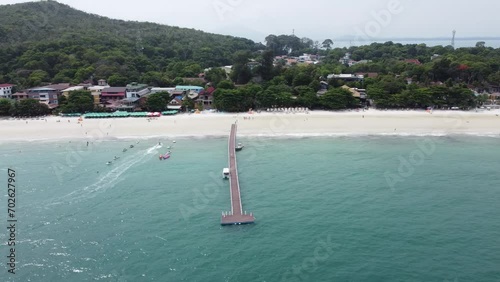 White beach with pier and speedboat. On Koh Samet, Rayong, Thailand aerial view