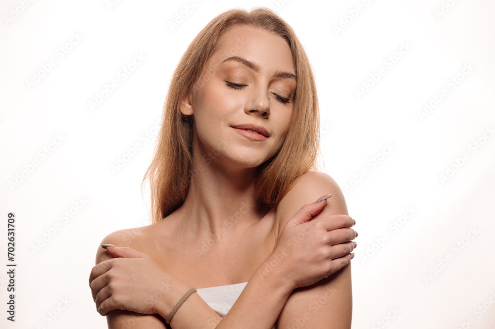 Beauty portrait of pretty blonde girl on isolated white background. Skin care concept Beauty portrait of pretty blonde girl on isolated white background. Skin care concept