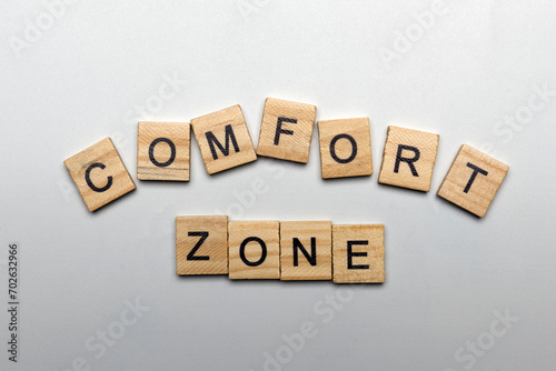A row of wooden cubes with comfort zone letters