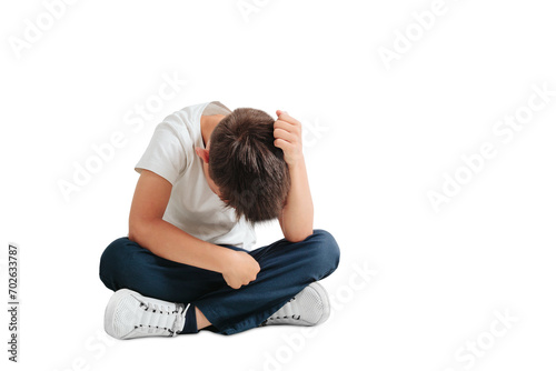 a child whose depression is sitting on the floor