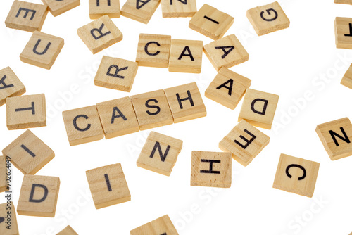 Closeup view row of wooden cubes with CASH letters