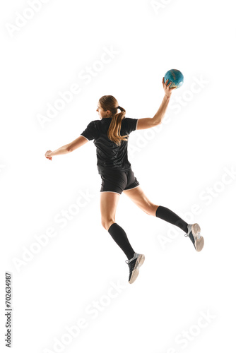 Dynamic portrait of focused female handball athlete in mid-throw, showcasing athleticism and dedication against white background. Concept of professional sport, movement, dynamic, championship. Ad © Lustre Art Group 