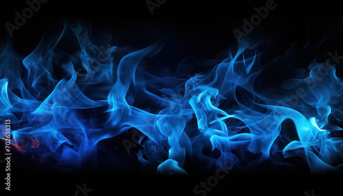 Tongues of blue fire on clear black background, blue flames and sparks background design