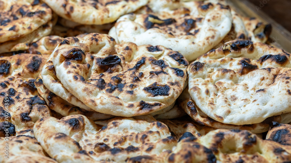 Freshly baked tradition Arabic bread - Pita, sold at the city market