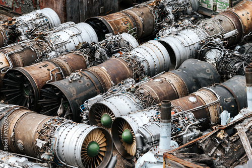 scrap metal dump. old aircraft parts. decommissioned aircraft engines. industry, scrap metal recycling photo