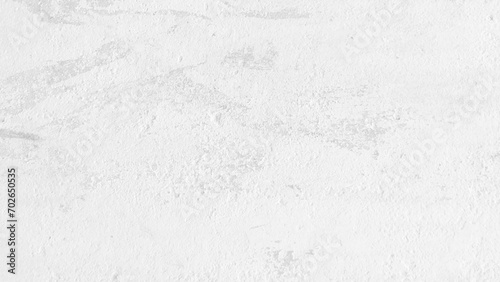 White cement wall in retro concept. Old concrete background for wallpaper or graphic design. Blank plaster texture in vintage style. Modern house interiors that feel calm and simple. photo