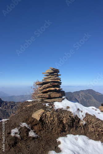 Stone cairns at Kalinchowk temple photo