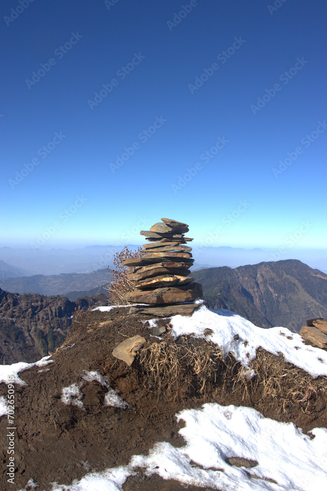 Stone cairns at Kalinchowk temple Stone cairns at Kalinchowk temple