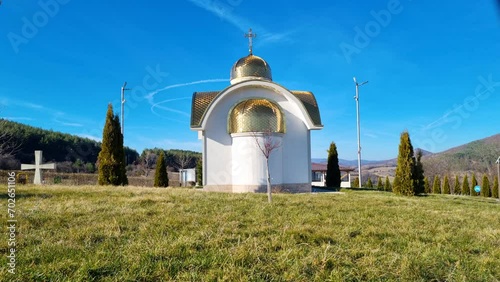 Time Lapse of a Christian Chapel and blue sky photo