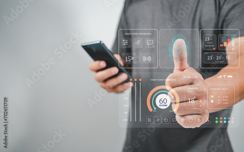 Human are scanning their fingers to use smart applications, Smart home concept, Smart home Automation Control System, Smart home dashboard interface control connected devices and set up automations.