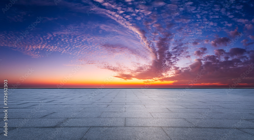 Empty square floor and spectacular sky with clouds at sunset. high angle view.