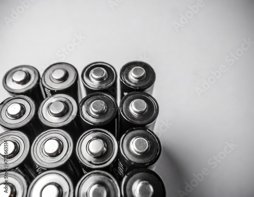 AI generated illustration of an assortment of batteries on a flat surface