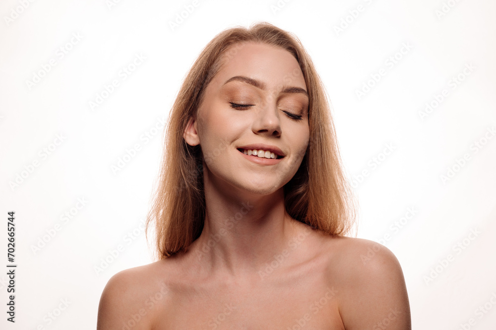 Portrait of beautiful blonde girl in beauty style with smooth clean skin on isolated white background Portrait of beautiful blonde girl in beauty style with smooth clean skin on isolated white background