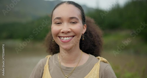 Nature, smile and face of young woman on a vacation, weekend trip or adventure in a forest. Happy, travel and portrait of African female person with positive and good attitude for outdoor adventure. photo