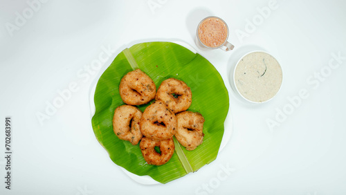 Madhu Vada, Crisp vadai meets flavorful chutney, a South Indian culinary affair that ignites the senses. photo