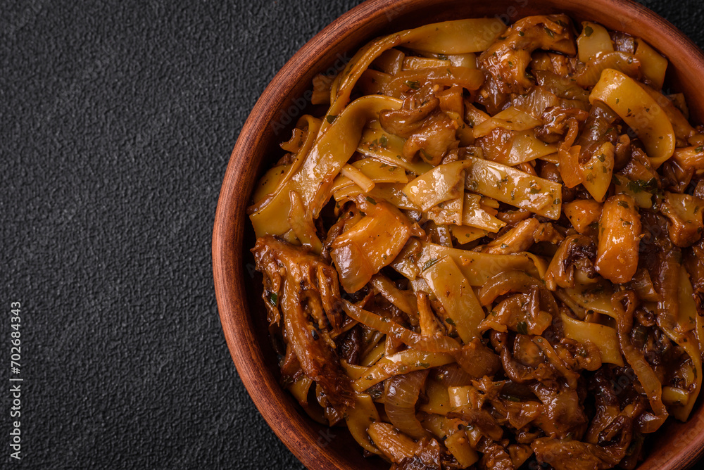 Delicious asian udon dish with vegetables, mushrooms, salt and spices Delicious asian udon dish with vegetables, mushrooms, salt and spices