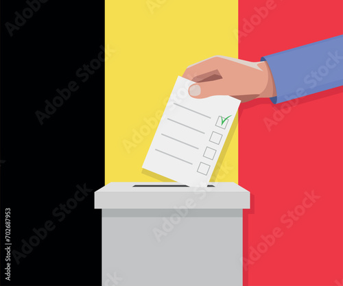 Belgium election concept. Hand puts vote bulletin