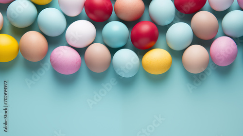 Colorful Easter eggs against a blue background.