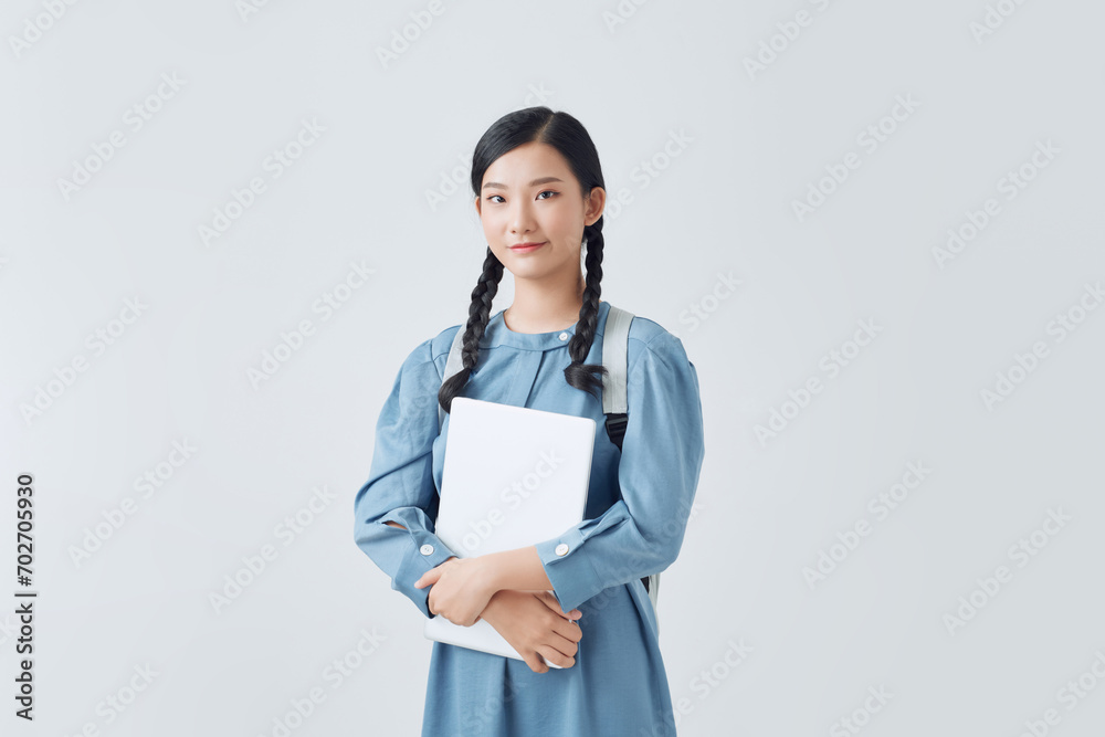 Young student woman isolated on white background Young student woman isolated on white background