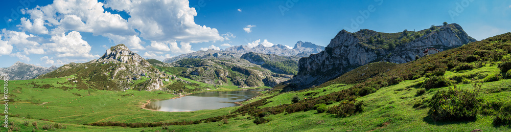 Scenic view of Covadonga Lakes in Asturias, Spain against a cloudy blue sky