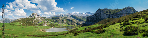 Fototapeta Naklejka Na Ścianę i Meble -  Scenic view of Covadonga Lakes in Asturias, Spain against a cloudy blue sky