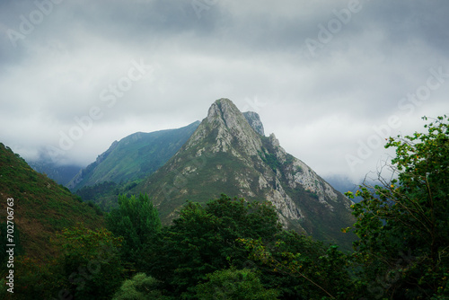 Stunning landscape of Asturias  Spain with green mountains against a cloudy sky
