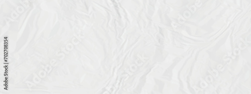White crumpled paper texture . White wrinkled paper texture. White paper texture . White crumpled and top view textures can be used for background of text or any contents . photo