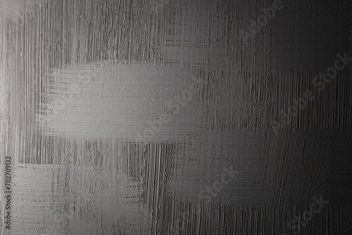 Gray plaster gradient background.Wall of grey stucco photo