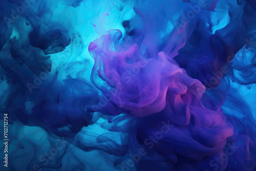 a blue and purple flame against a black background