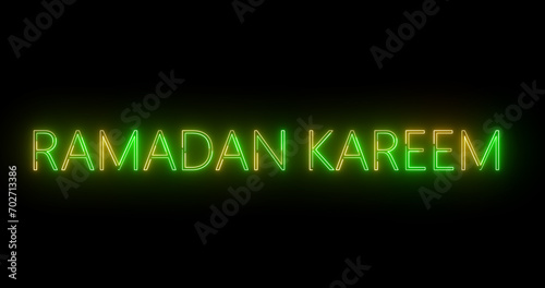 Glowing Ramadan Kareem Text animation with neon sign effect. Glittering glowing Islamic month of spirituality, hajj background. Elegant neon style glowing Happy Ramadan Arabic background.