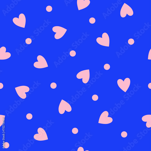 Repeating pink hearts and polka dots on a blue background. Endless romantic print. Vector illustration.	