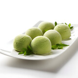 Japanese Green Tea Mochi ice cream on a white plate 