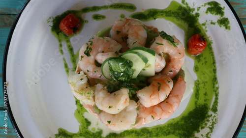 Causa rellena de langostinos, palta y papa, Causa stuffed with prawns, avocado and potato photo