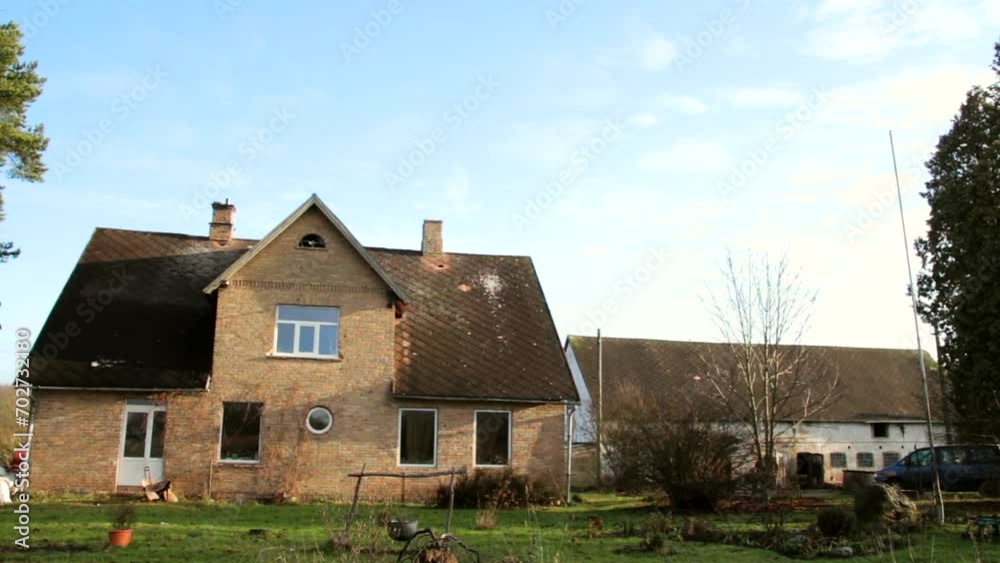 Steadicam Wide Shot of A Very Simple Country House and Barn Building in the Background Steadicam Wide Shot of A Very Simple Country House and Barn Building in the Background