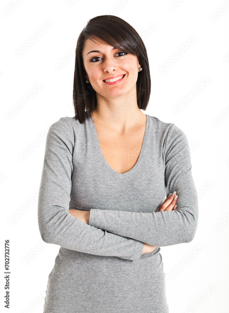 Confident young businesswoman standing with arms crossed Confident young businesswoman standing with arms crossed