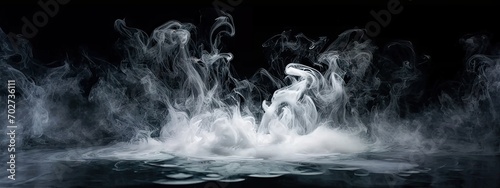 Abstract background with delicate swirls and translucent fog. Enchanting vapor. Beautiful black and white smoke design. Ethereal waves. Smooth and mysterious in dark studio setting