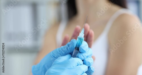 Doctor with vaccine syringe and hand refusing patient refuses. Medicine healthcare and anti-vaccine concept photo