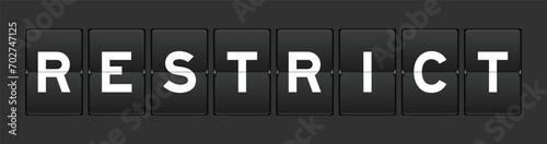 Black color analog flip board with word restrict on gray background