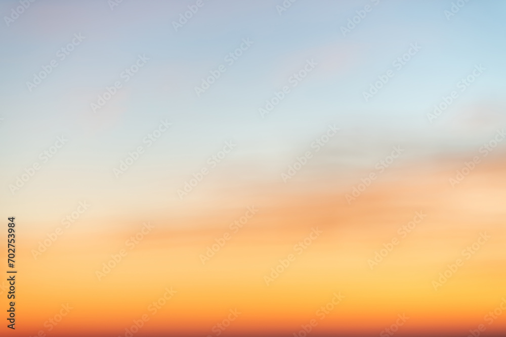 Fototapeta premium Sky gradient from blue to orange sunset