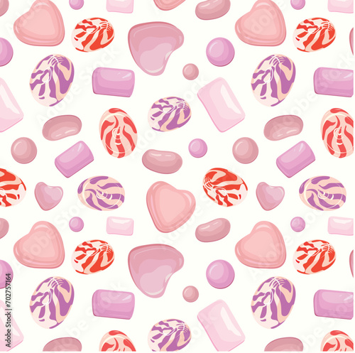 Pattern of pink candies and caramel for Valentine's Day background or candy design.