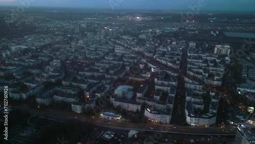 Aerial flyover high angle footage of Lake Floreasca in the capital of Romania - Bucharest. Drone cityscape footage of urban area from above. Sector 1 view from up high. The Promenade seen from above.
 photo
