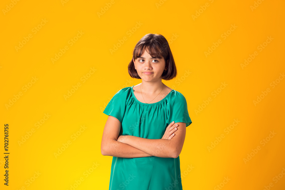 Smiling kid girl over yellow background. Emotion concept Smiling kid girl over yellow background. Emotion concept