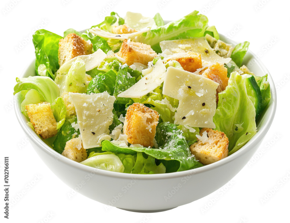 Caesar salad in a white bowl isolated. Caesar salad in a white bowl isolated.