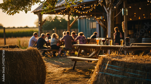 Rustic countryside brewery, outdoor setting, hay bales, wooden picnic tables, families enjoying beer tastings