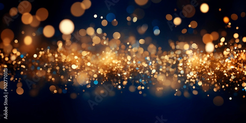 Dark blue gradient background with stars and circles in gold color in bokeh effect.Glitter luxury gold. The background for the holiday.