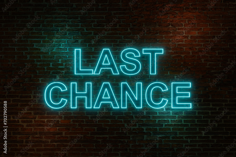 Last chance. Brick wall at night with neon sign, text Last chance. Brick wall at night with neon sign, text