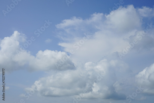 white clouds on a blue sky background